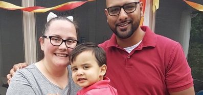 A photo of the Vaithilingham family: Jenny, Darren and their son Elias