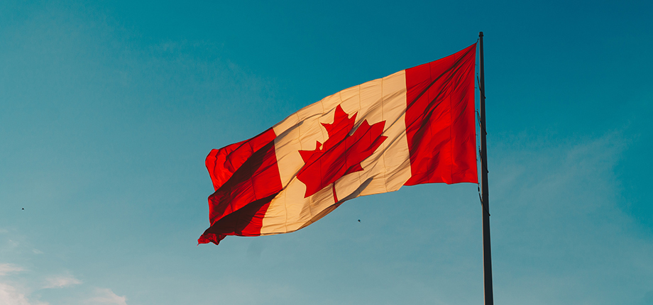 The Canadian flag blowing in the wind