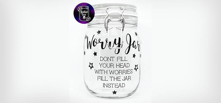 A worry jar decorated with stars and the text "Don't fill your head with worries - fill the jar instead"
